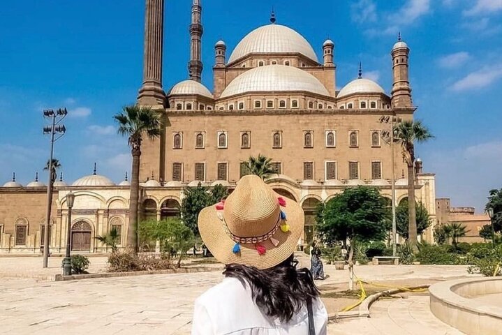 Girl admiring the historic Cairo Citadel in Egypt